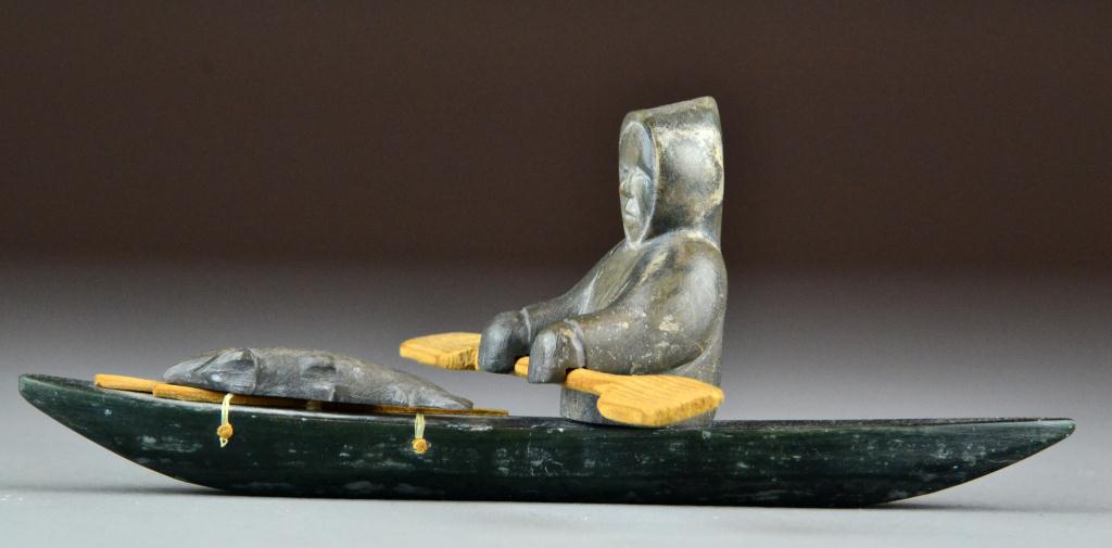 Inuit Stone Carving of Figure in KayakDepicting