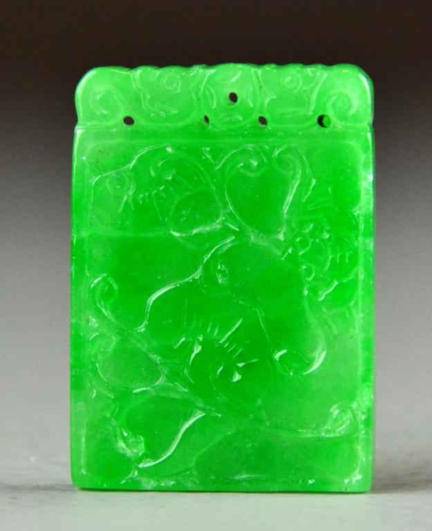 A Fine Chinese Qing Carved Jadeite