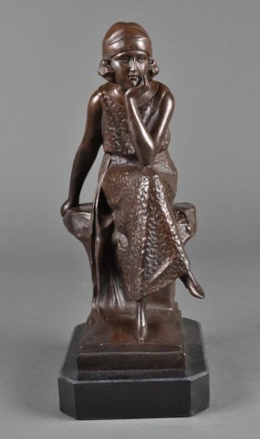 A Fine Signed Bronze SculptureFinely