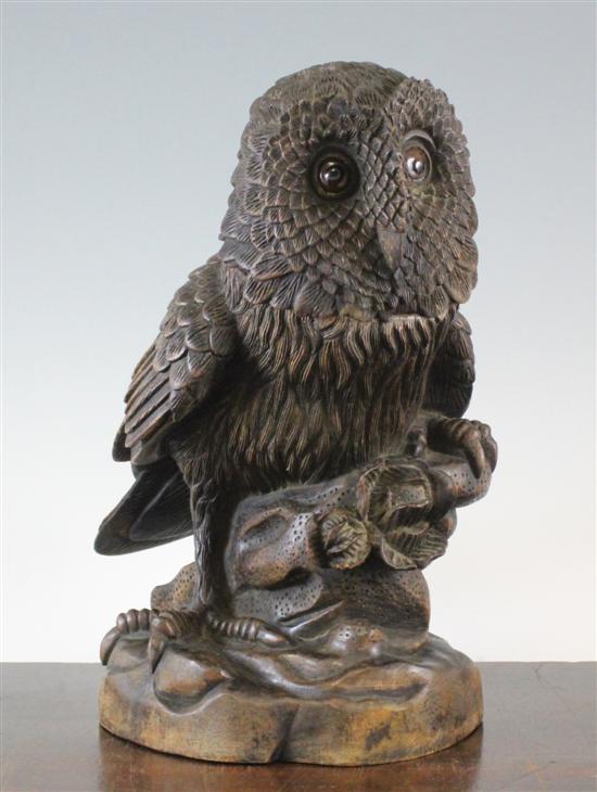 A Black Forest carved wood owl