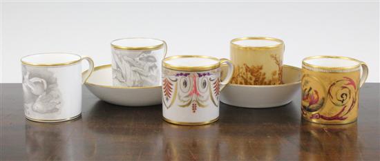 Four Paris porcelain coffee cans and