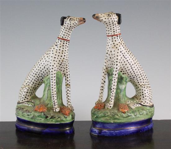 A pair of Staffordshire figures