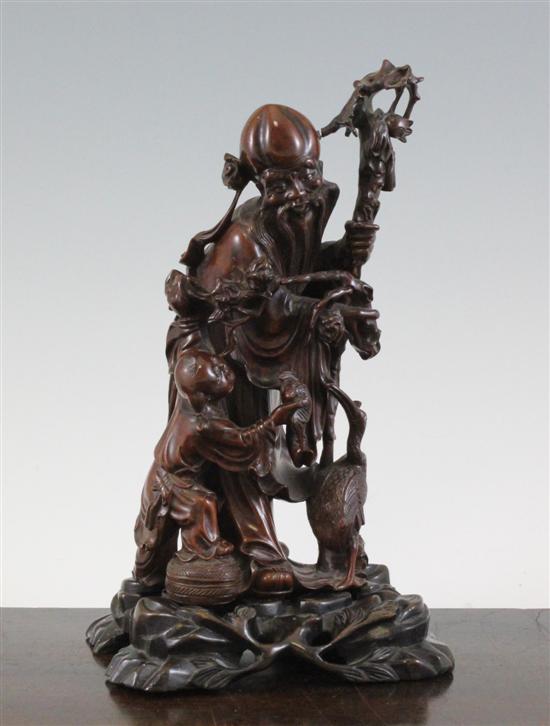 A Chinese wood carving of Shou