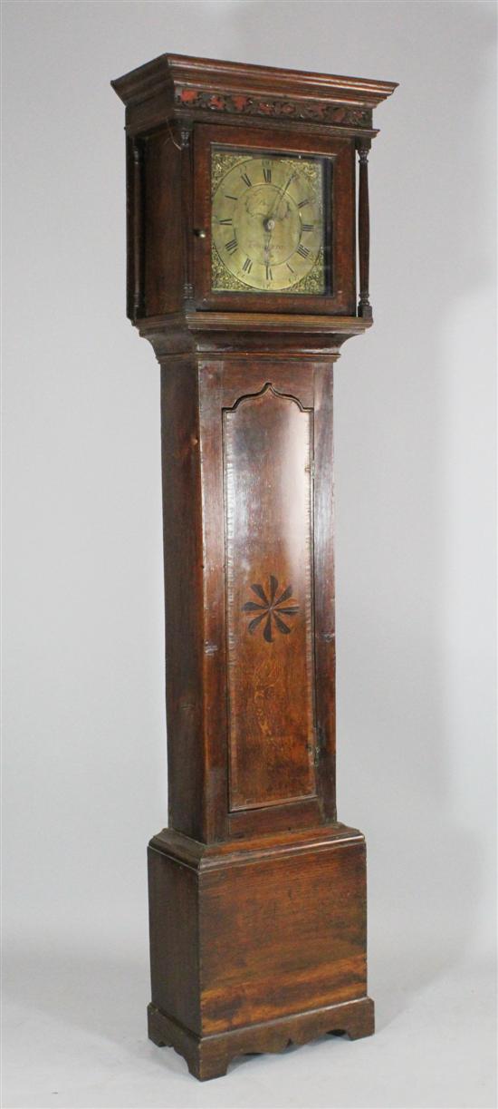 A mid 18th century inlaid oak thirty