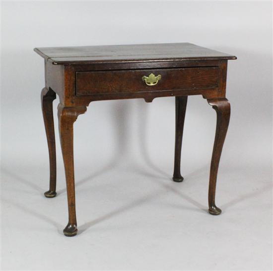 A George II oak side table with 172d56