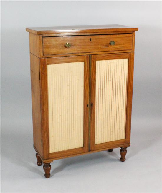 A Regency satinwood cabinet with