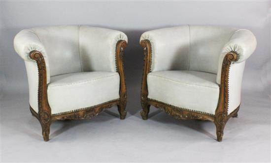 A pair of Edwardian carved and