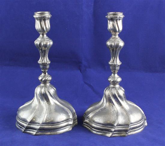 A pair of continental silver candlesticks 172e03