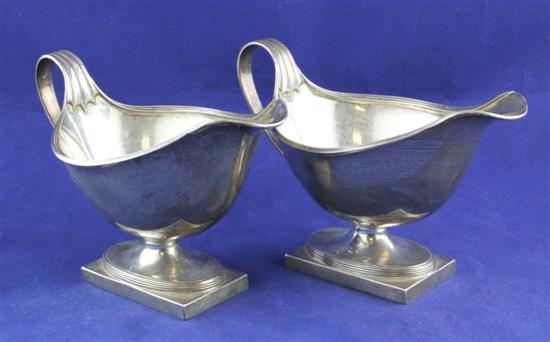 A pair of George V silver sauce