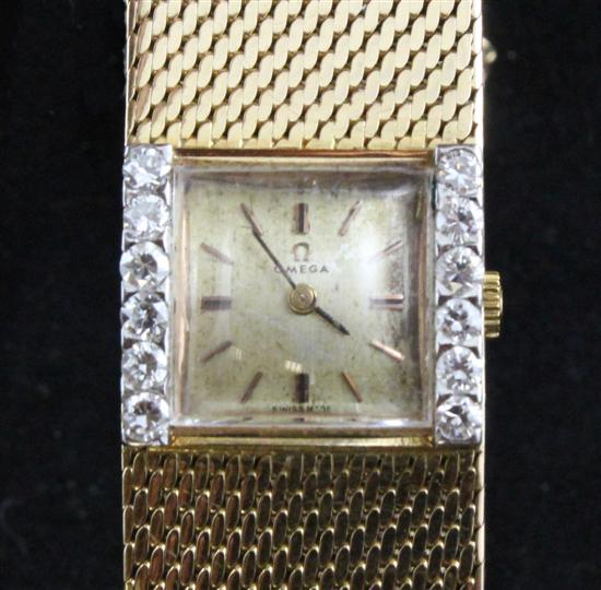 A ladys 18ct gold and diamond set Omega