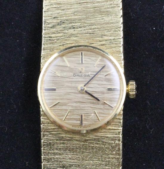 A lady's textured 18ct gold Omega