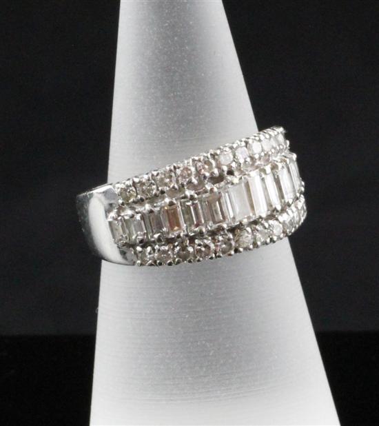 An 18ct white gold baguette and