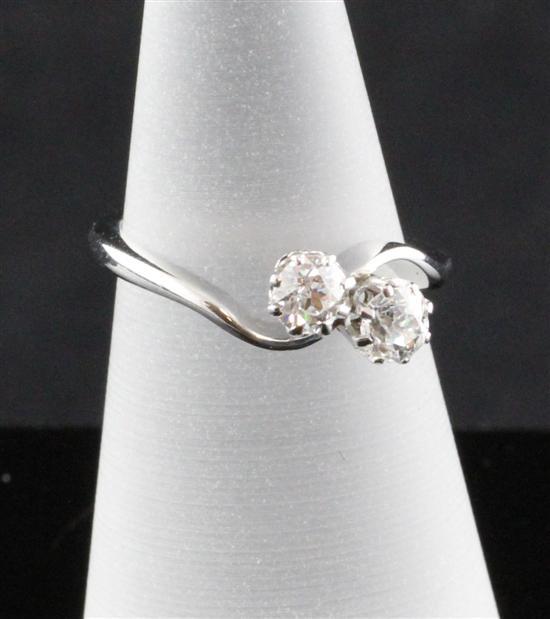 An 18ct white gold two stone diamond