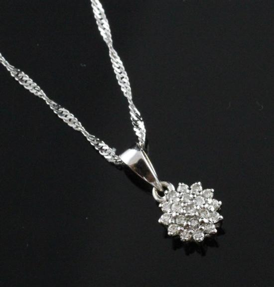 An 18ct white gold and diamond