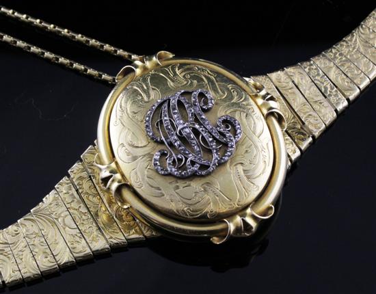 A Victorian diamond set gold locket