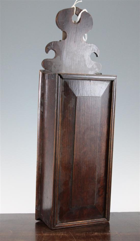 A mid 18th century oak candle box 173035