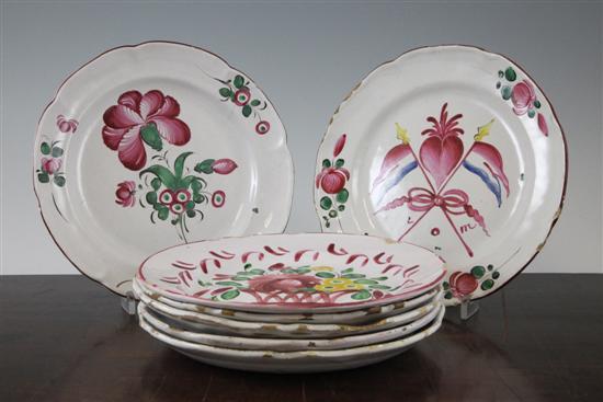 Seven French faience polychrome plates