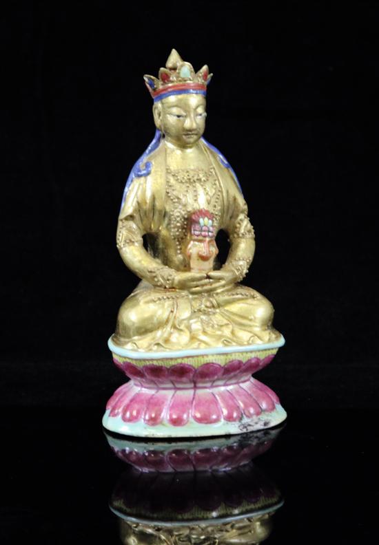 A Chinese famille rose seated figure 173102