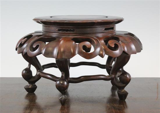 A Chinese rosewood stand the petal