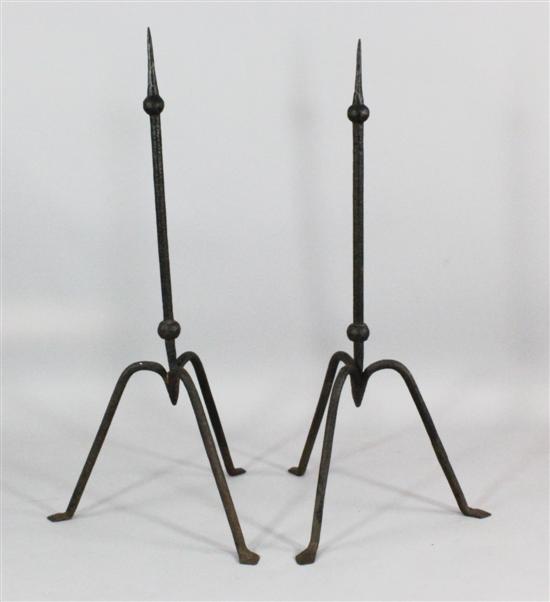 A pair of large iron pricket candlesticks 17314d