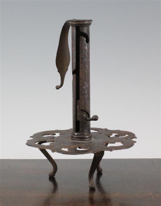 An iron adjustable candle holder 173167