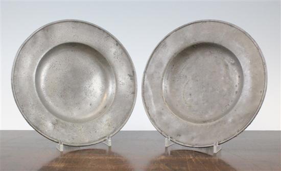 A pair of pewter deep plates late 17316a