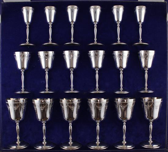 A graduated set of eighteen modern silver