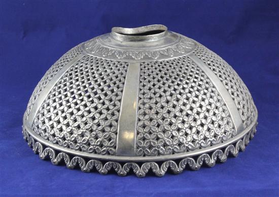 An Indian white metal lamp shade