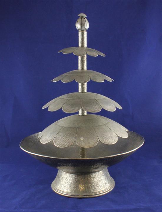 An Indian white metal drink's fountain