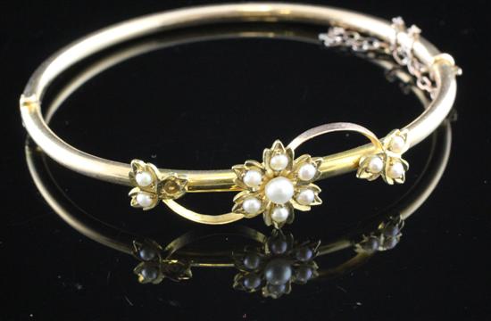 An Edwardian gold bracelet set