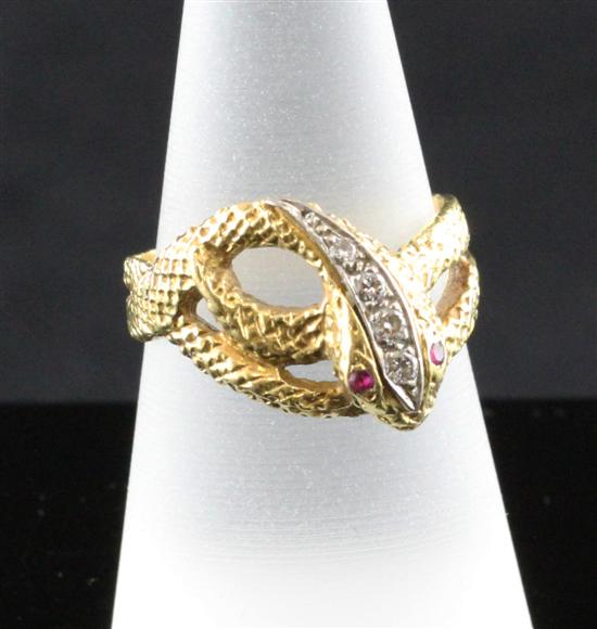 An 18ct gold ruby and diamond set