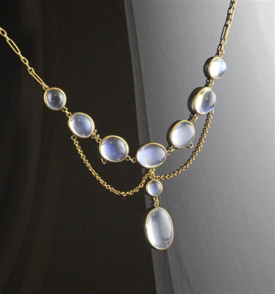 A gold mounted spectacle set moonstone