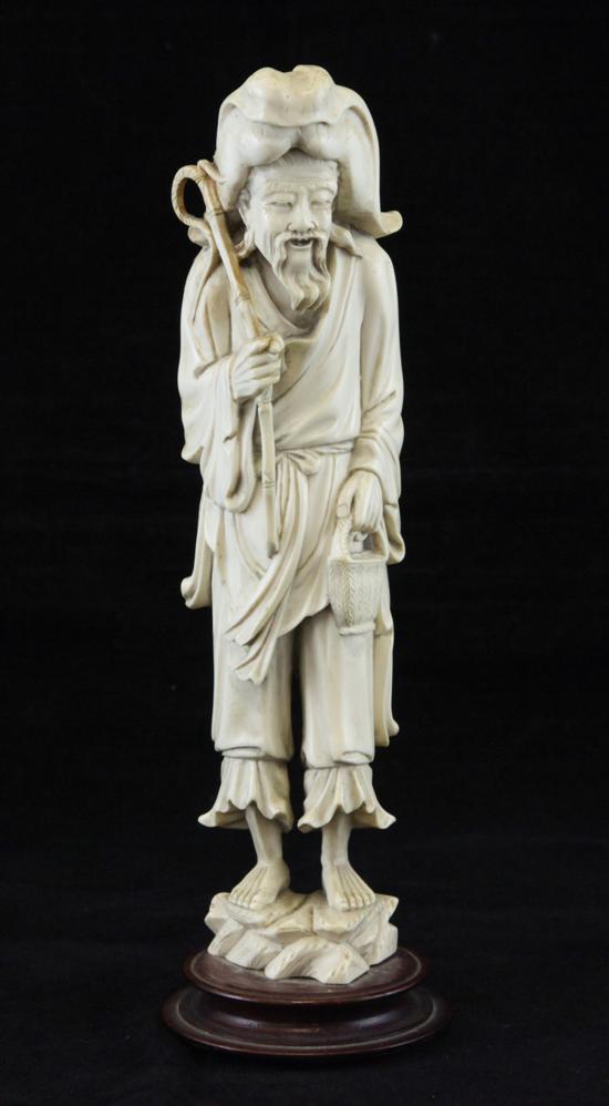 A Chinese ivory figure of a man 170dc2