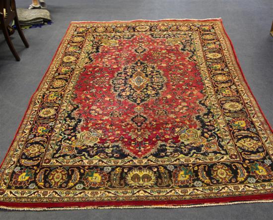 A Persian carpet with central foliate 170e09
