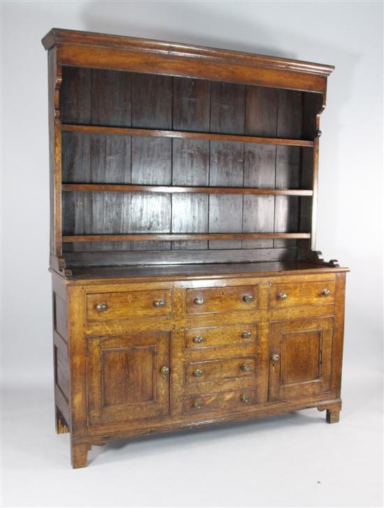 A George III oak dresser with three