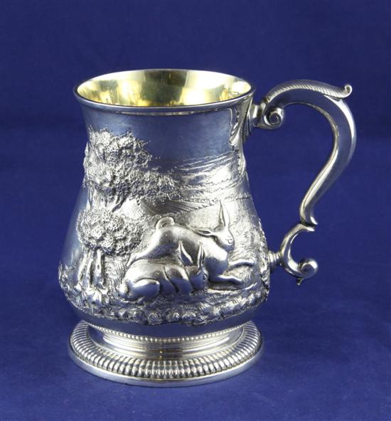 A George II silver mug with later 170ec1