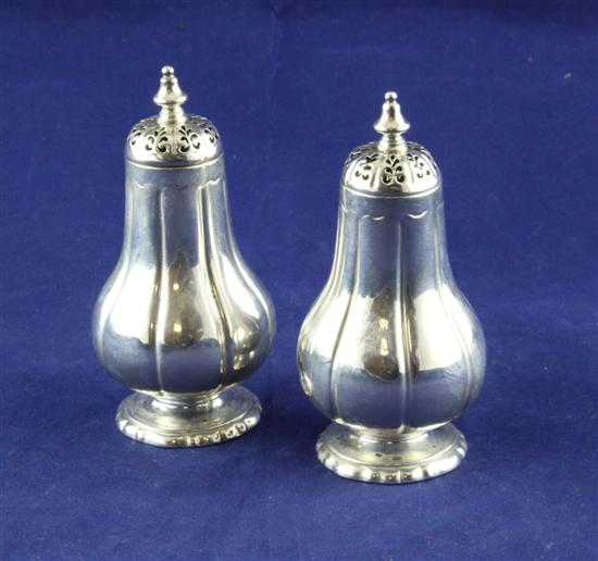 A pair of Victorian silver pepperettes 170f07