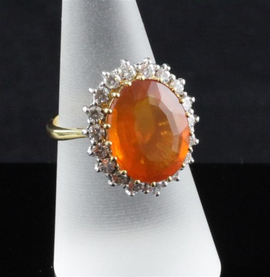 An 18ct gold diamond and fire opal 170f94