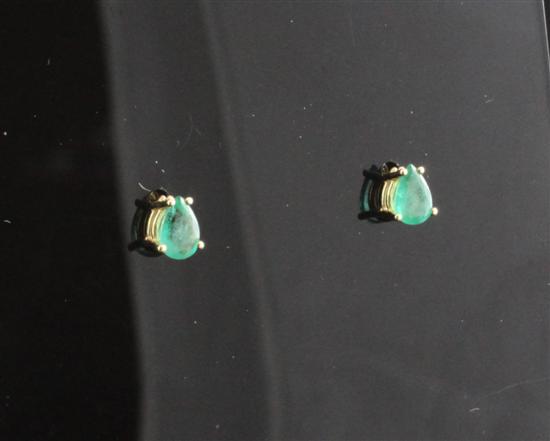A pair of gold mounted emerald