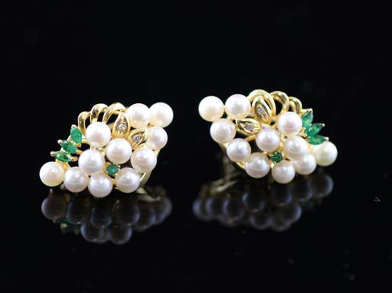 A pair of gold diamond emerald