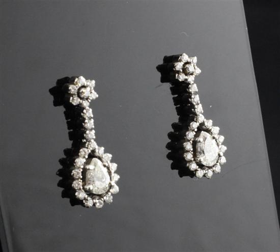 A pair of 18ct white gold set diamond