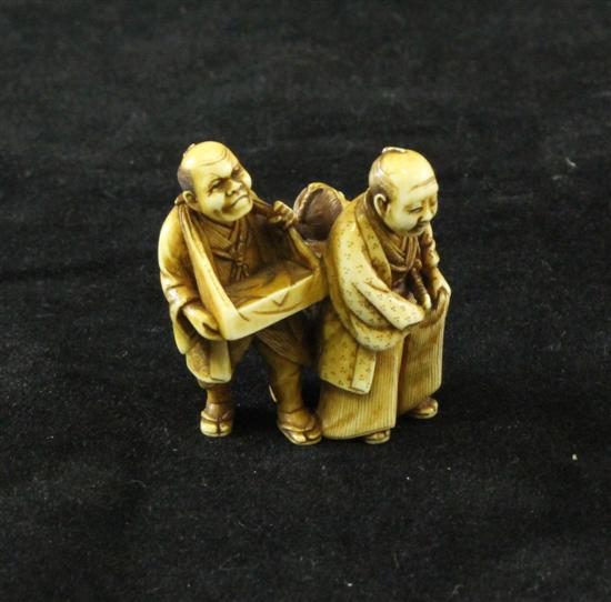 A Japanese stained ivory group 17128e