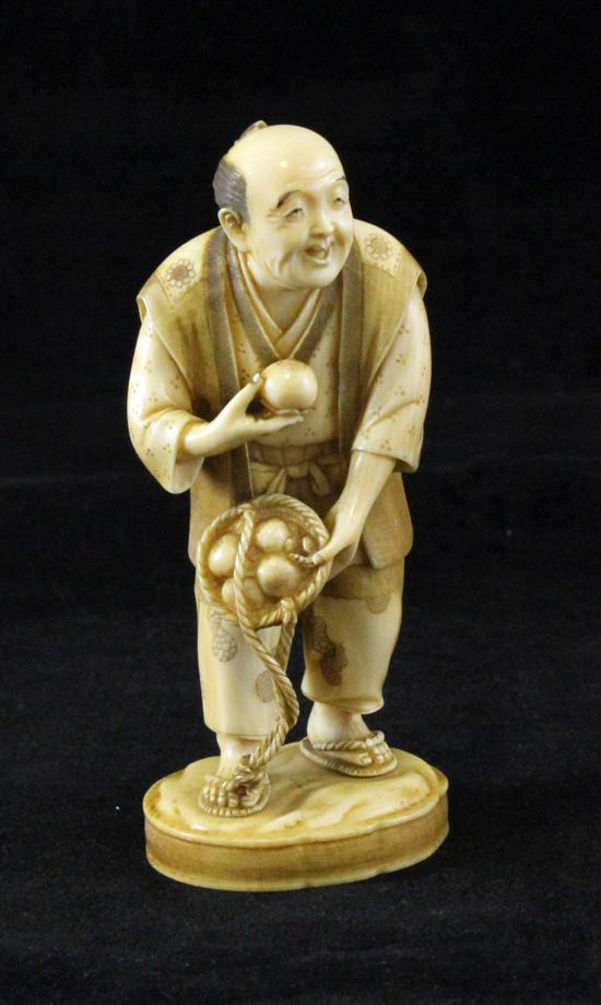 A Japanese ivory figure of a Persimmon 171289