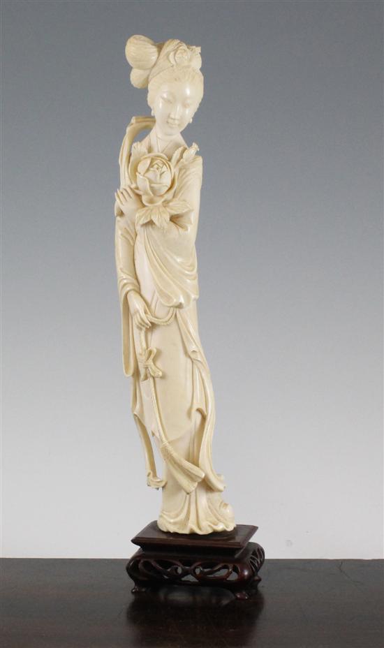 A Chinese ivory standing figure of a