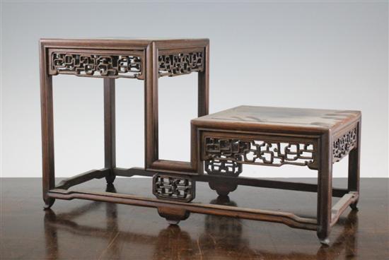 A Chinese rosewood two tier stand