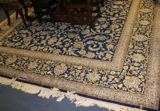 A Kashan carpet with field of scrolling 17130b