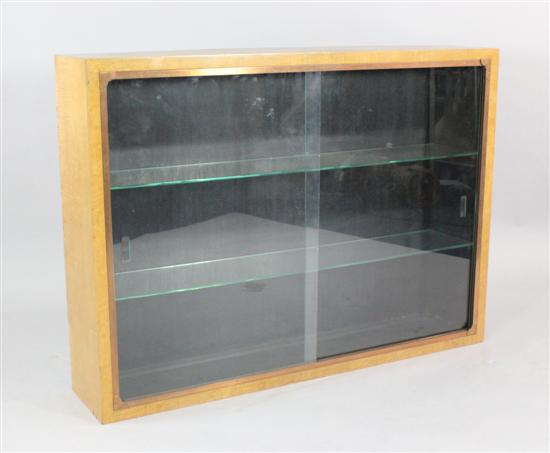 An Art Deco maple dwarf bookcase