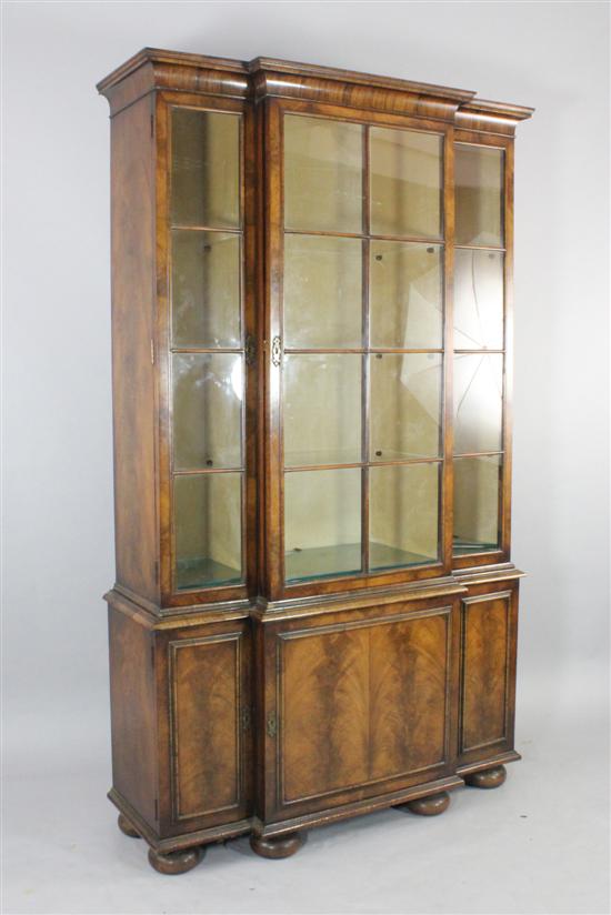 A 1930's walnut breakfront display