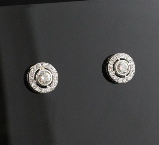 A pair of 18ct white gold and diamond