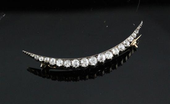 An Edwardian gold and diamond crescent 171473